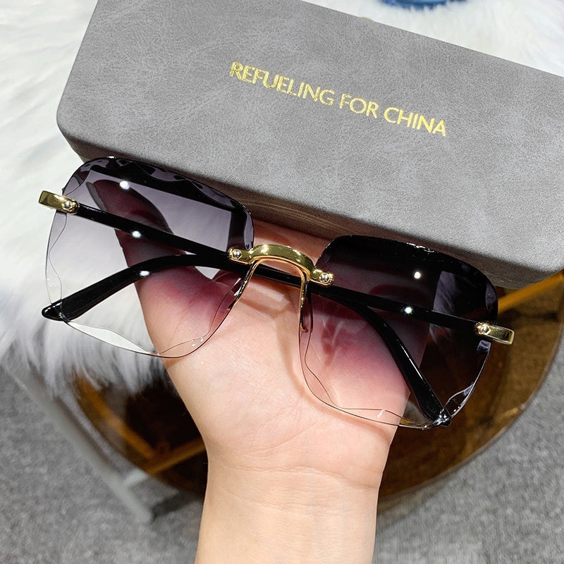 Womens Frameless Trimmed Trendy UV-Protective Glasses