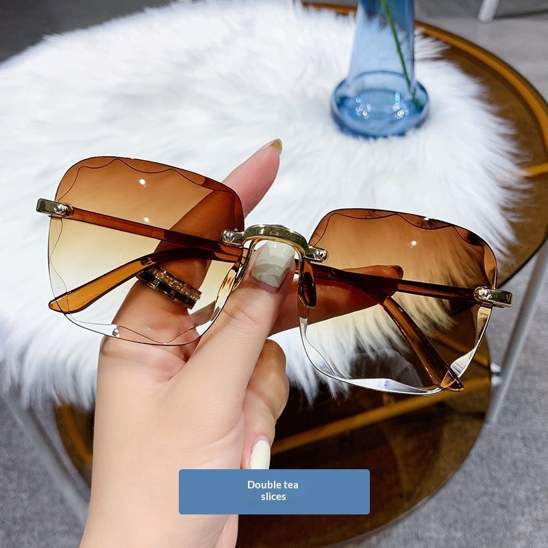 Womens Frameless Trimmed Trendy UV-Protective Glasses